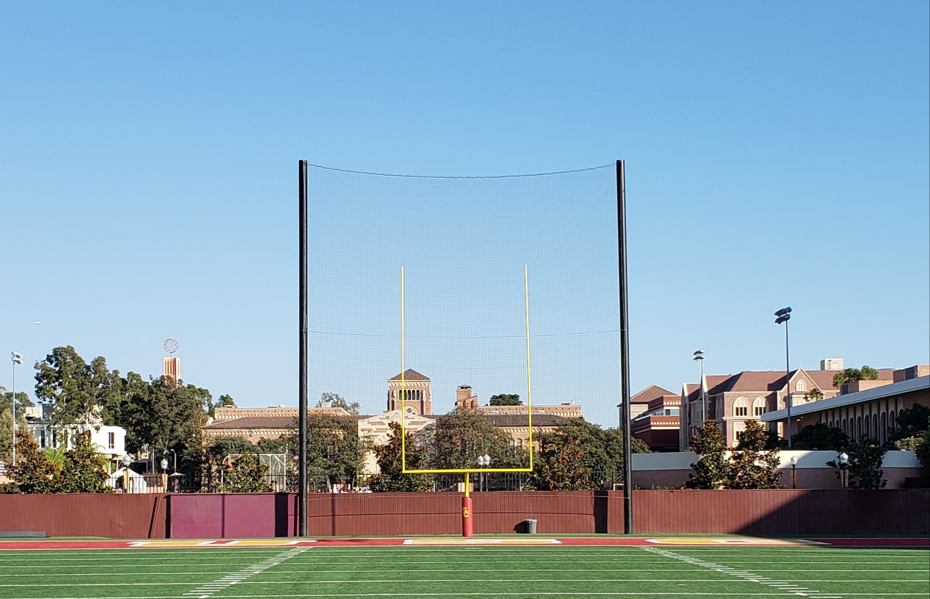 Judge Netting Barrier Specialists: USC Football practice field protected by sports field netting barriers.