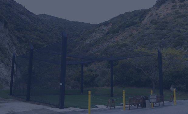 Judge Netting Barrier Specialists: A park with a mountain backdrop.