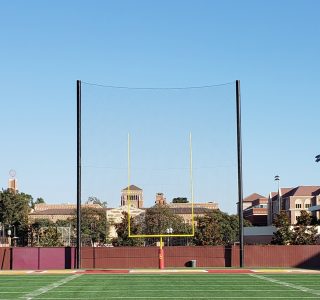 Judge Netting Barrier Specialists: USC Football practice field protected by sports field netting barriers.
