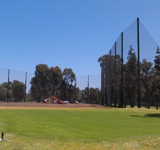 Judge Netting Barrier Specialists: A driving range surrounded by netting barriers.